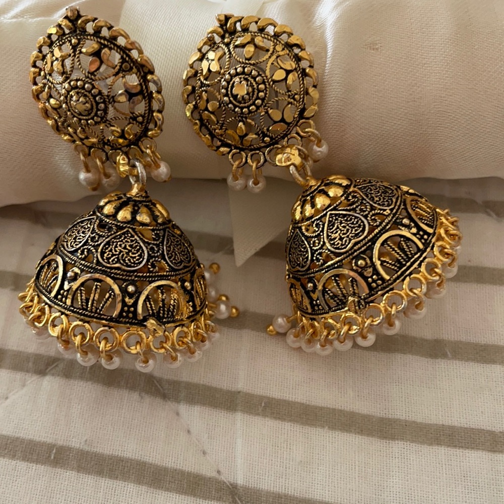 Traditional Indian gold jhumkis